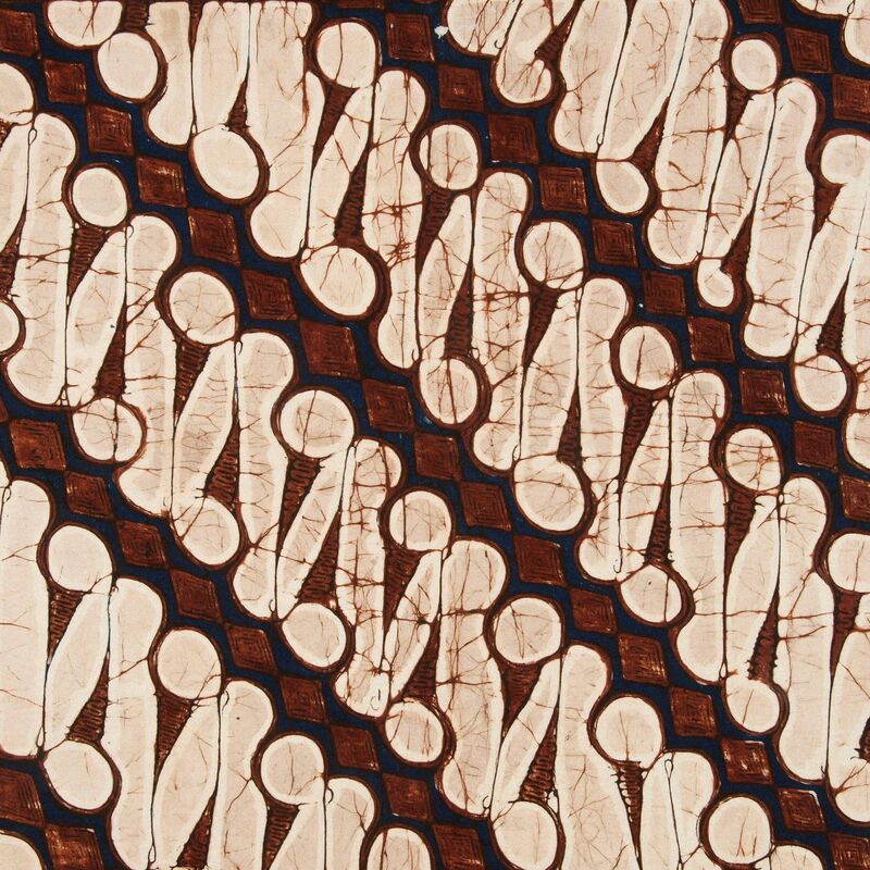 Brown and cream batik fabric with repeating pattern